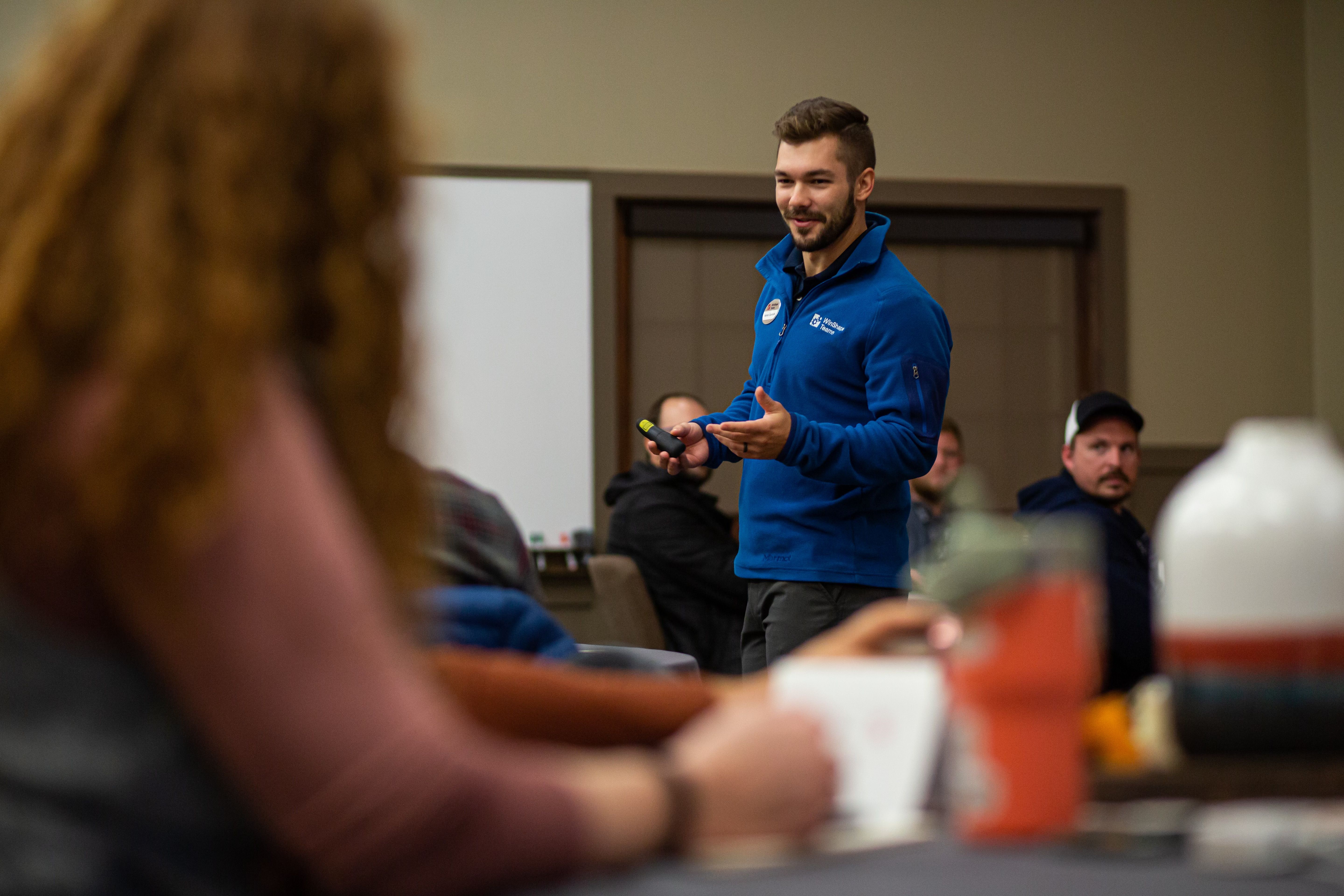 Nathan pointing during a presentation